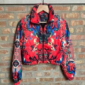 AKIRA cropped bomber jacket with a multi-color abstract print